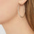 25th Wedding Anniversary Large Matt Silver Hoop Earrings On Model | Lily Gardner London